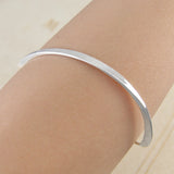 Hammered Curved Silver Bangle