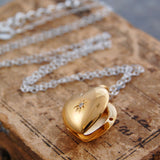 White Topaz and Gold Heart Locket
