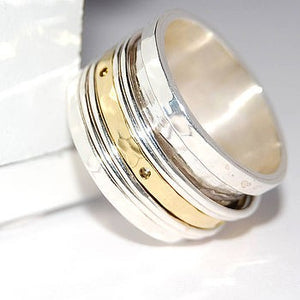Hammered Spinning Silver and Gold Ring