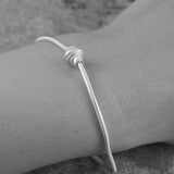 Coiled Silver Charm Bracelet