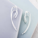 Statement Silver Curled Wishbone Earrings